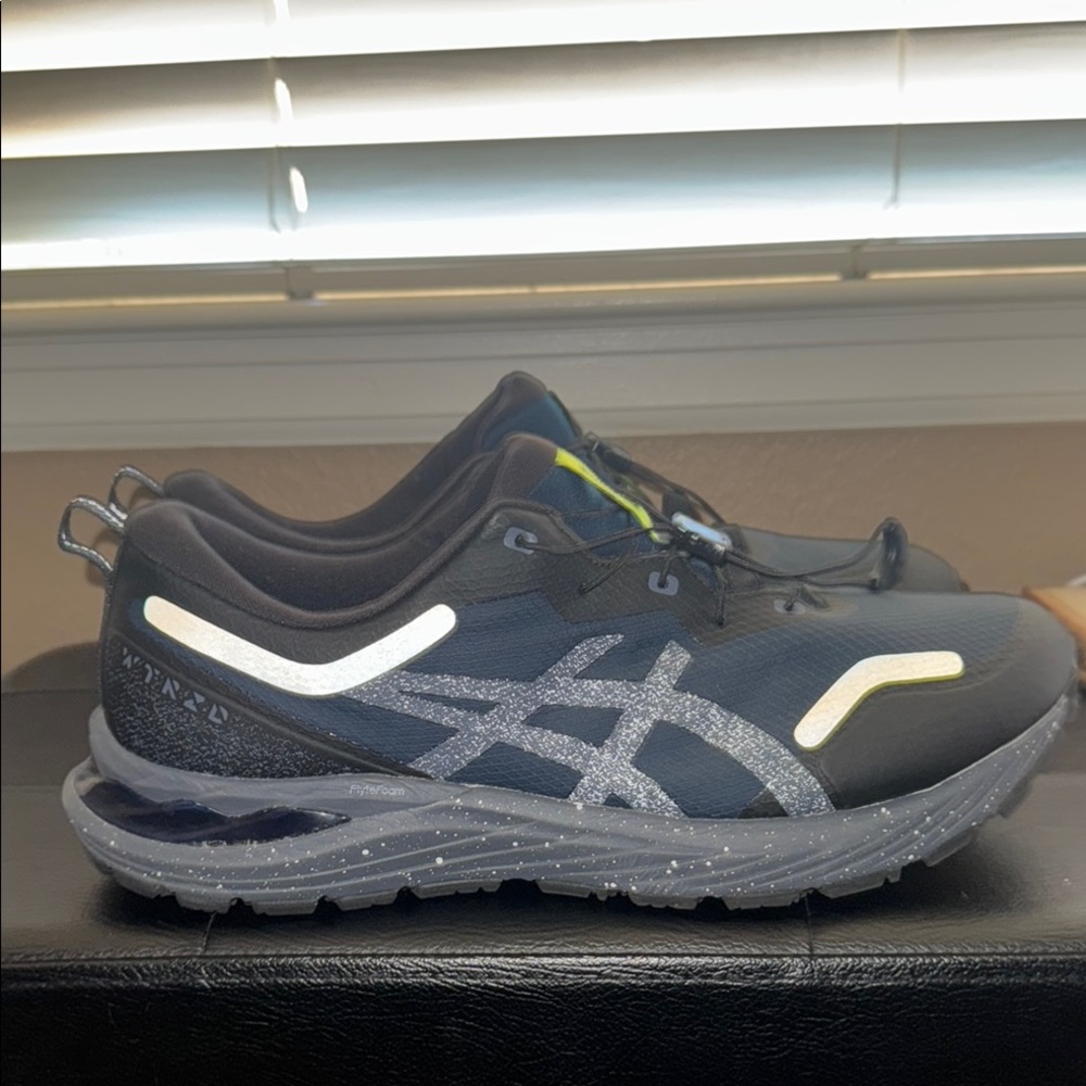 Asics GEL-CUMULUS 23 AWL Black and Gray Athletic Shoe Design water repellent.